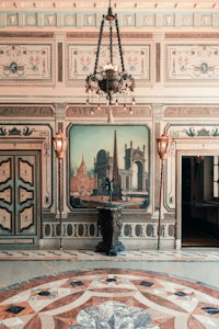 an ornately decorated room with a chandelier